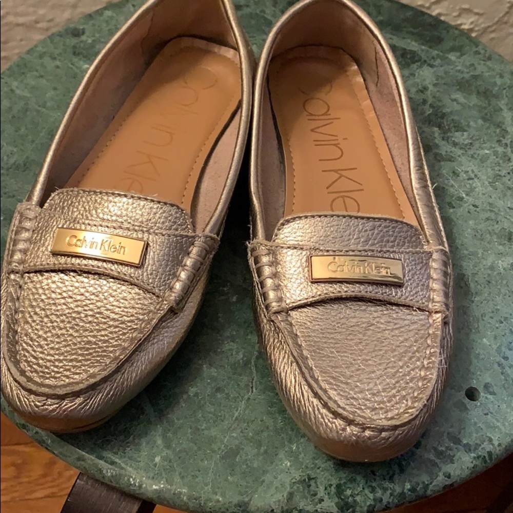 Nwot Calvin Klein gold loafers